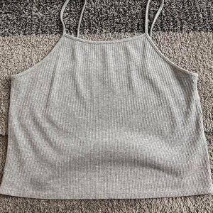 American eagle gray tank size medium but fits like a large /xl? Super stretchy